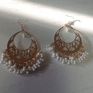 Large gold tone earrings‎